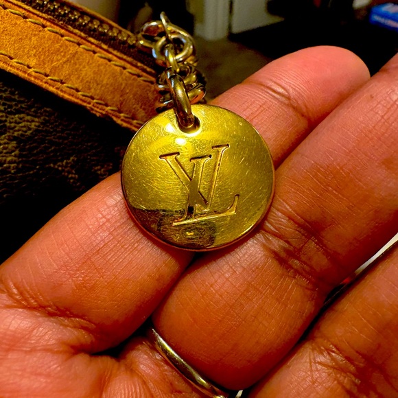 Pampered pre-owned Louis Vuitton Satchel.  Original lining can & a nicked strap.